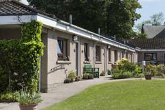 Garden Court cottages with grass area and plants