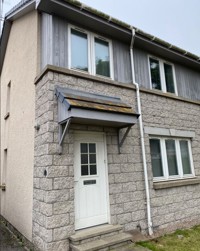 Front of property with two floors showing windows on both floors and 2 steps leading to front door