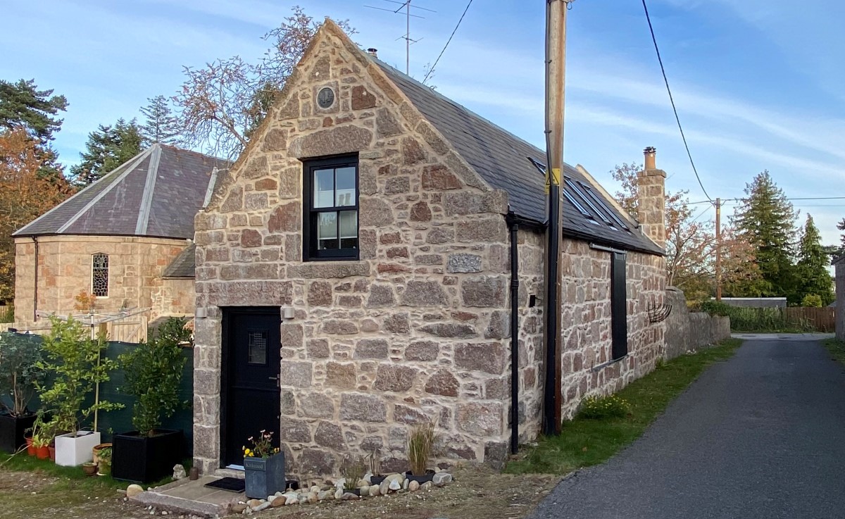 Front of St Margarets showing stone building and road on right side