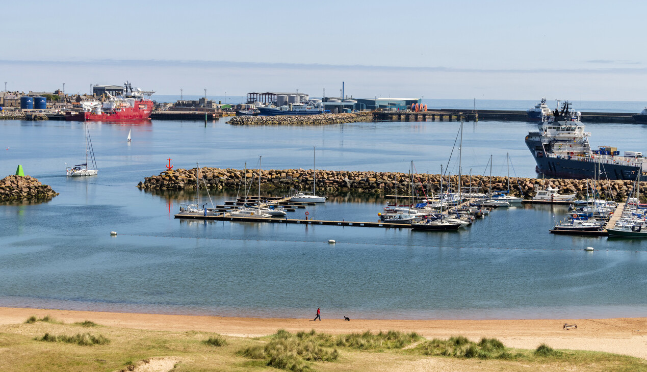 Sailing boats and large vessels at Peterhead Marina and Port